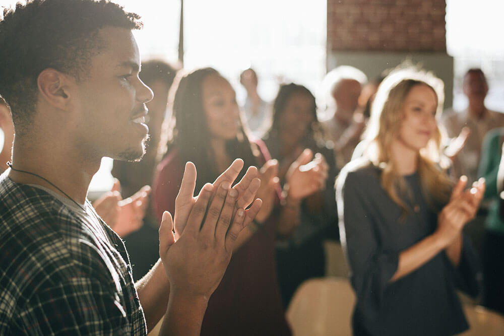 People clapping their hands